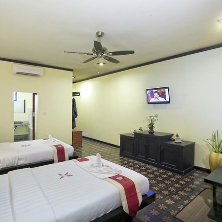 Residence Indochine Suite Siem Reap Quarto foto